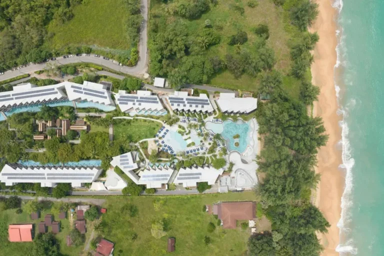 Aerial View of Coastal Resort Featuring Multiple Pools and Beach Access at Mai Khao Beach
