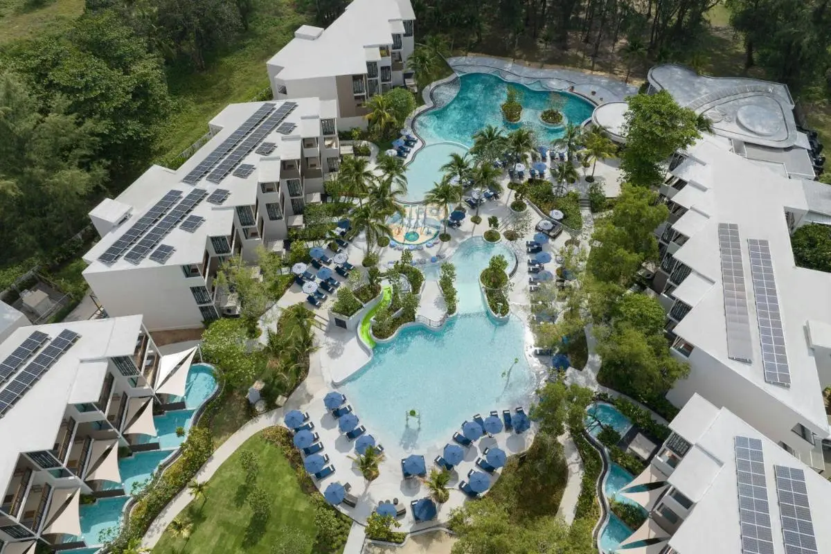 Aerial View of Large Interconnected Swimming Pools with Tropical Landscaping at Mai Khao Beach