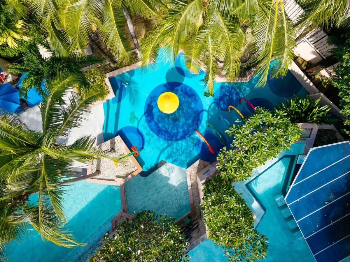 Aerial View of Multi-Sectioned Outdoor Pool with Tropical Surroundings at Kata Beach