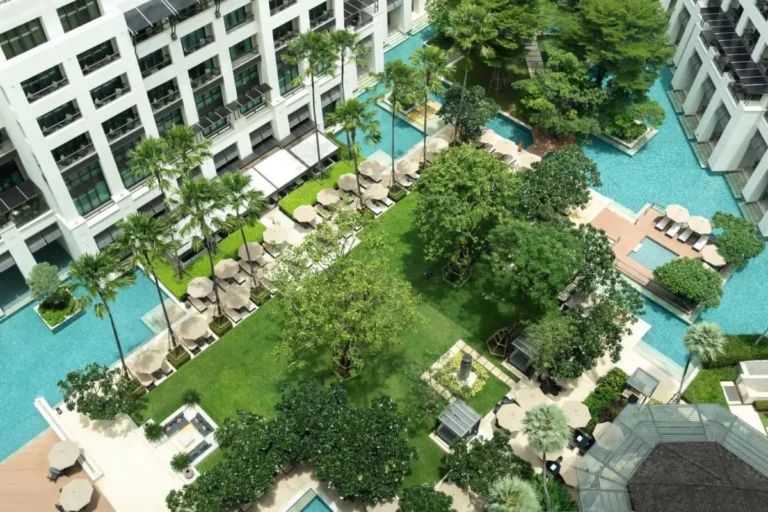 Aerial View of Outdoor Pools and Green Spaces in Pathumwan Residential Complex