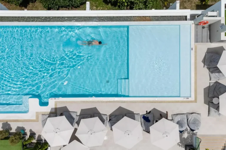 Aerial View of Outdoor Swimming Pool and Lounge Area at Rawai Beach