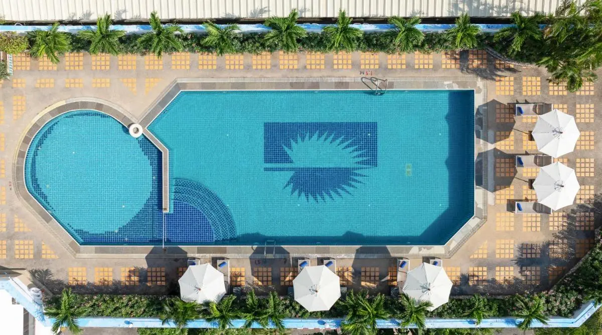 Royal Phuket City Hotel Aerial View of Rectangular Outdoor Swimming Pool with Circular Pool and Lounge Area in Phuket Town