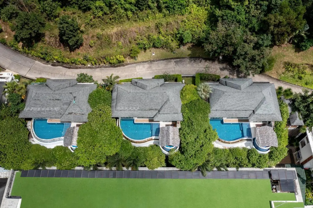 Aerial View of Residential Units with Private Pools and Green Spaces Near Patong Beach