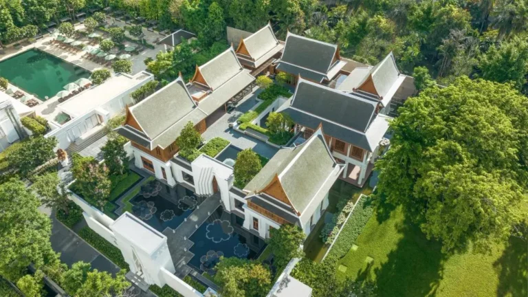 Aerial View of Traditional Architectural Complex with Pool and Water Features in Sathorn Bangkok