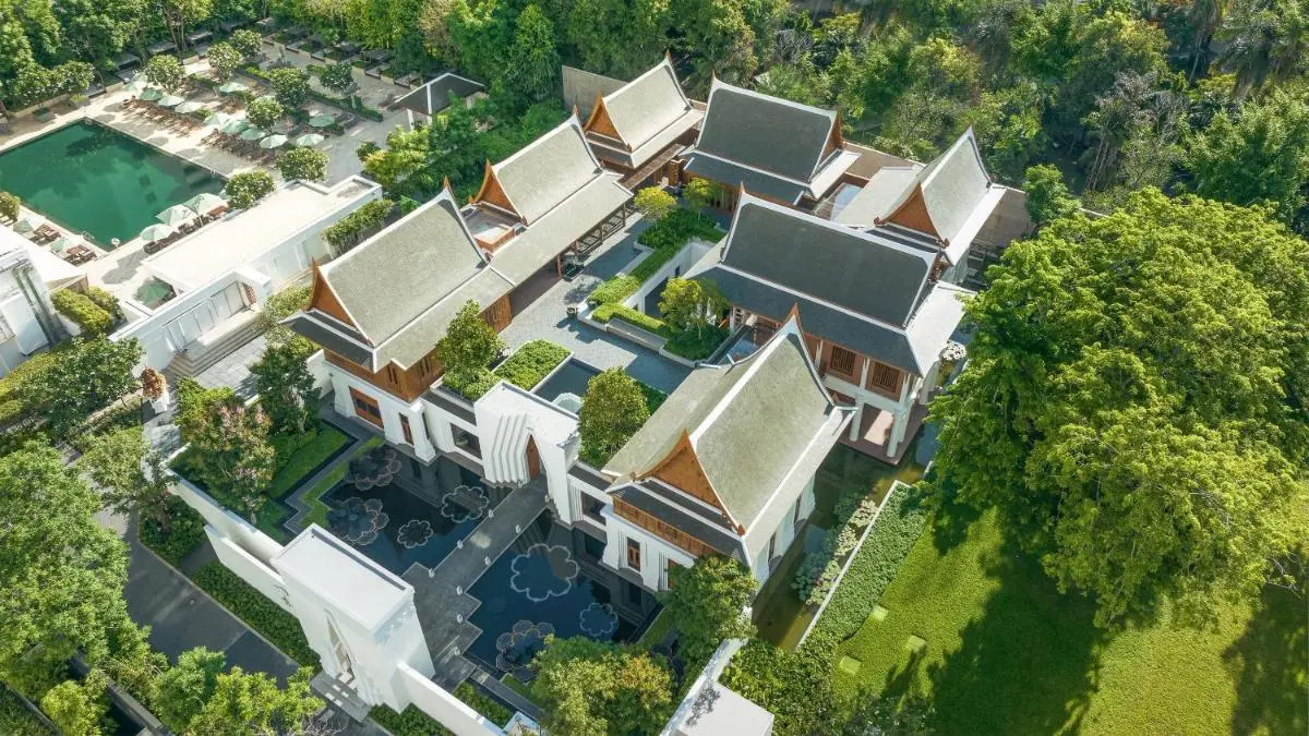 Aerial View of Traditional Architectural Complex with Pool and Water Features in Sathorn Bangkok