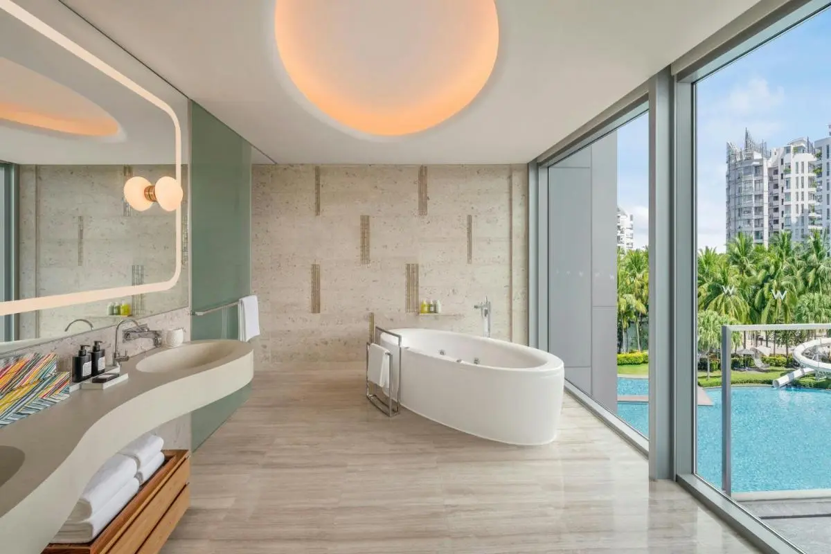 Bathroom with Oval Bathtub and Pool View on Sentosa Island Singapore