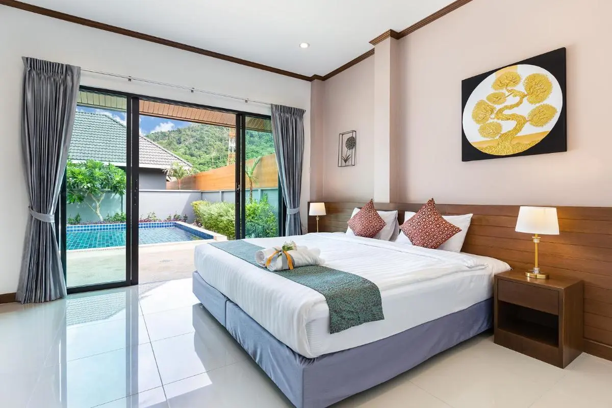 Bedroom with Private Outdoor Pool and Tranquil Greenery View at Rawai Beach