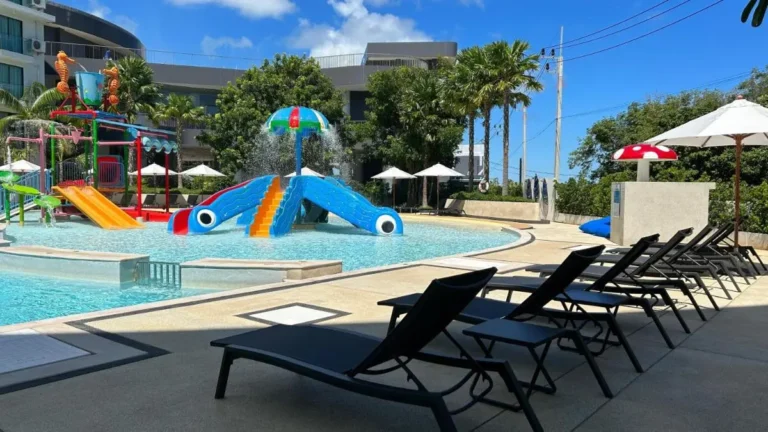 Children’s Outdoor Pool Area with Play Structures and Lounge Seating at Rawai Beach
