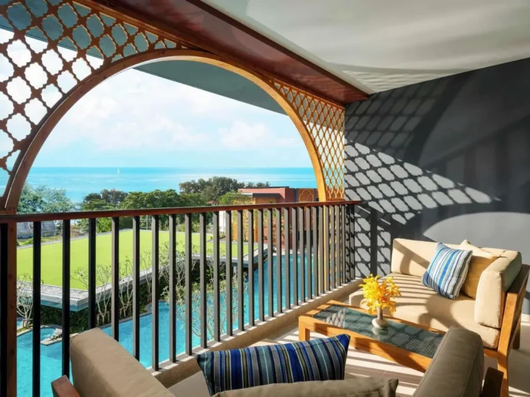 Coastal Balcony Overlooking Outdoor Pool and Ocean View at Karon Beach