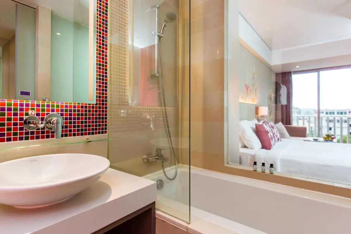 Grand Mercure Phuket Patong Contemporary Bathroom and Bedroom Design with Jacuzzi and Balcony View at Patong Beach Thailand