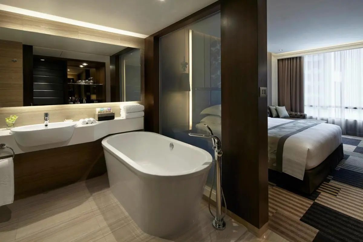The Landmark Bangkok Contemporary Bathroom and Bedroom Interior with Freestanding Tub in Khlong Toei