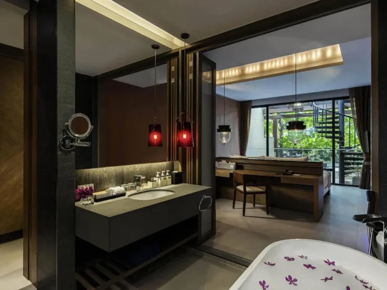 Contemporary Open-Plan Bathroom and Bedroom with Bathtub and Garden View at Patong Beach
