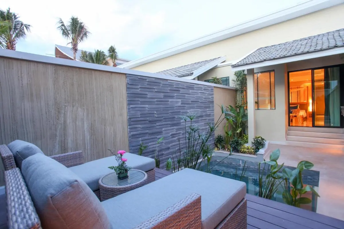CRAFT Resort & Villas, Phuket Town Cozy Outdoor Patio with Small Pool and Lounge Seating in Phuket Town