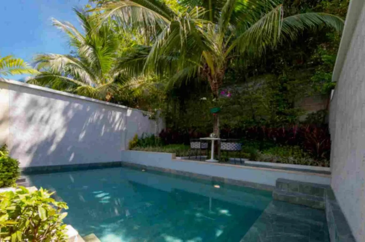 CRAFT Resort & Villas, Phuket Town Cozy Private Outdoor Pool and Shaded Seating Area Surrounded by Lush Greenery in Phuket Town Phuket Province