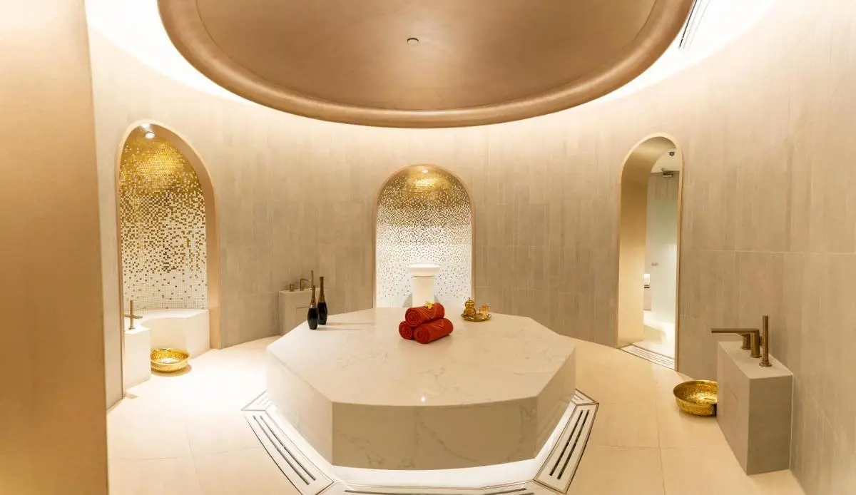 Elegant Circular Steam Room with Marble Platform and Gold Basins in Pathumwan Bangkok