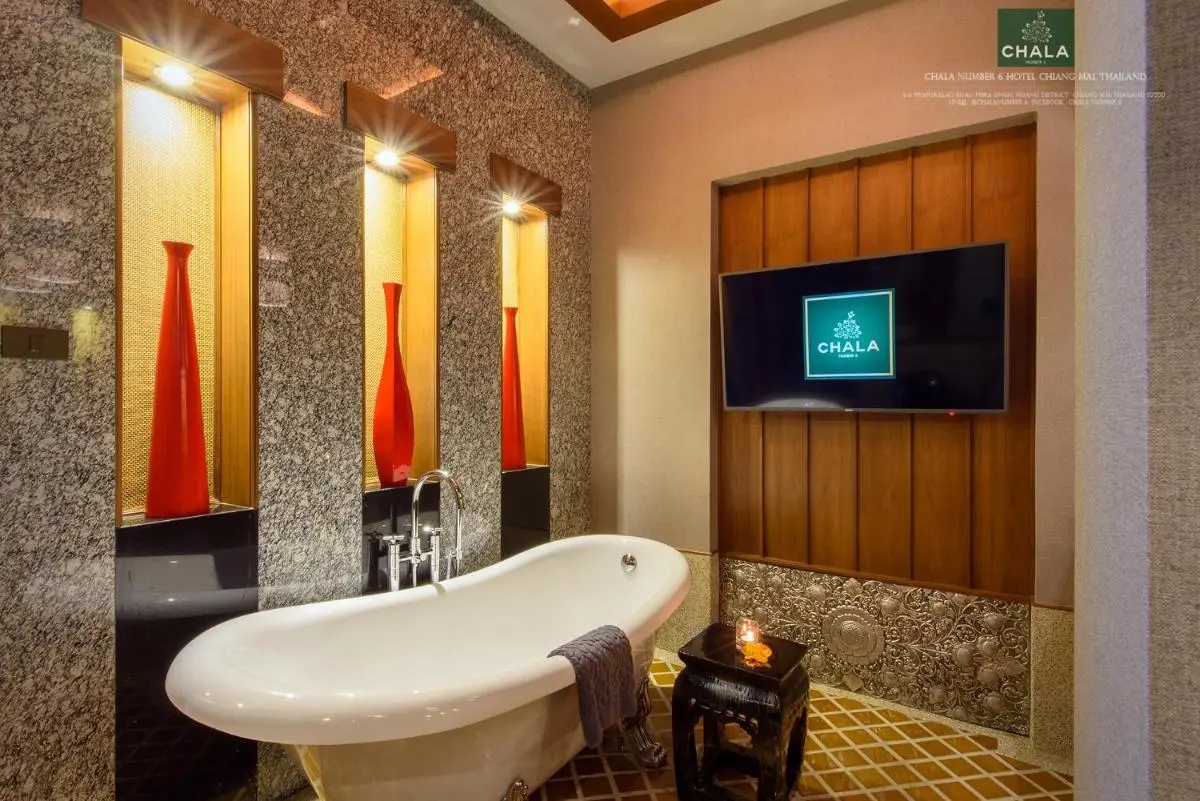 Chiang Mai Province Elegant Indoor Bathroom with Clawfoot Bathtub and Ambient Lighting in Phra Sing Chiang Mai