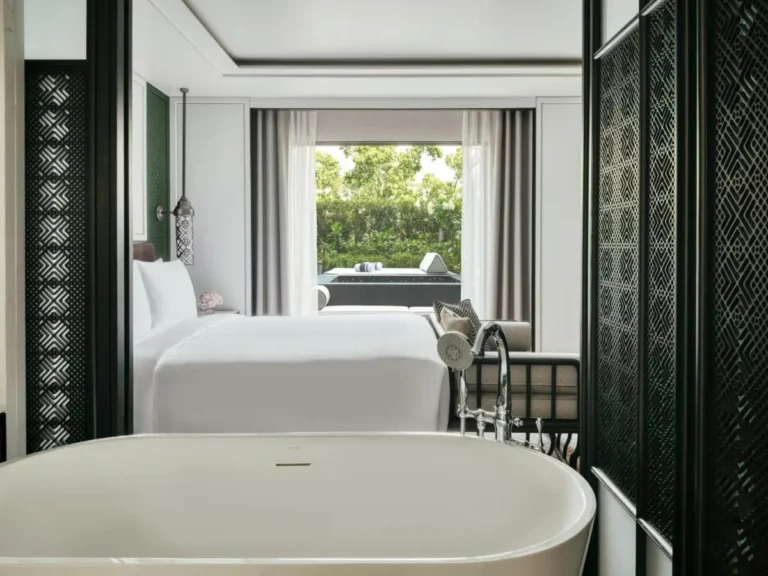 Elegant Interior Featuring Freestanding Bathtub and Outdoor Pool in Chang Khlan Chiang Mai