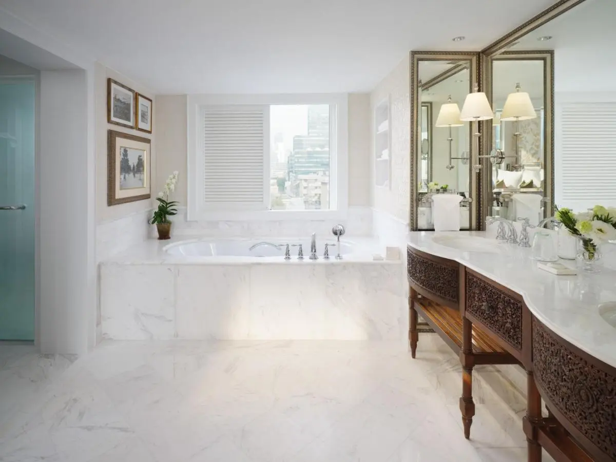 Mandarin Oriental, Bangkok Elegant Marble Bathroom with Built-In Bathtub and Double Sink Vanity in Bang Rak