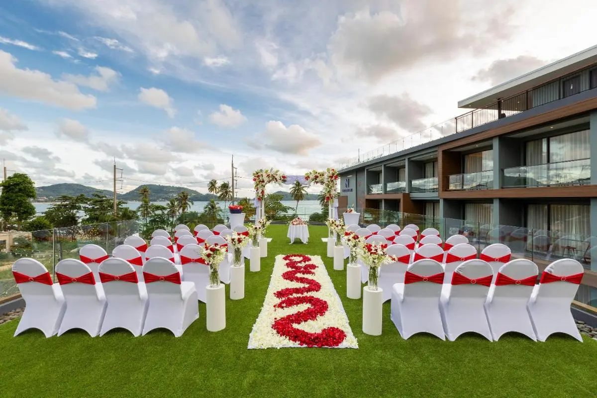 Elegant Outdoor Event Setup on Rooftop Terrace Overlooking Coastal Waters at Patong Beach