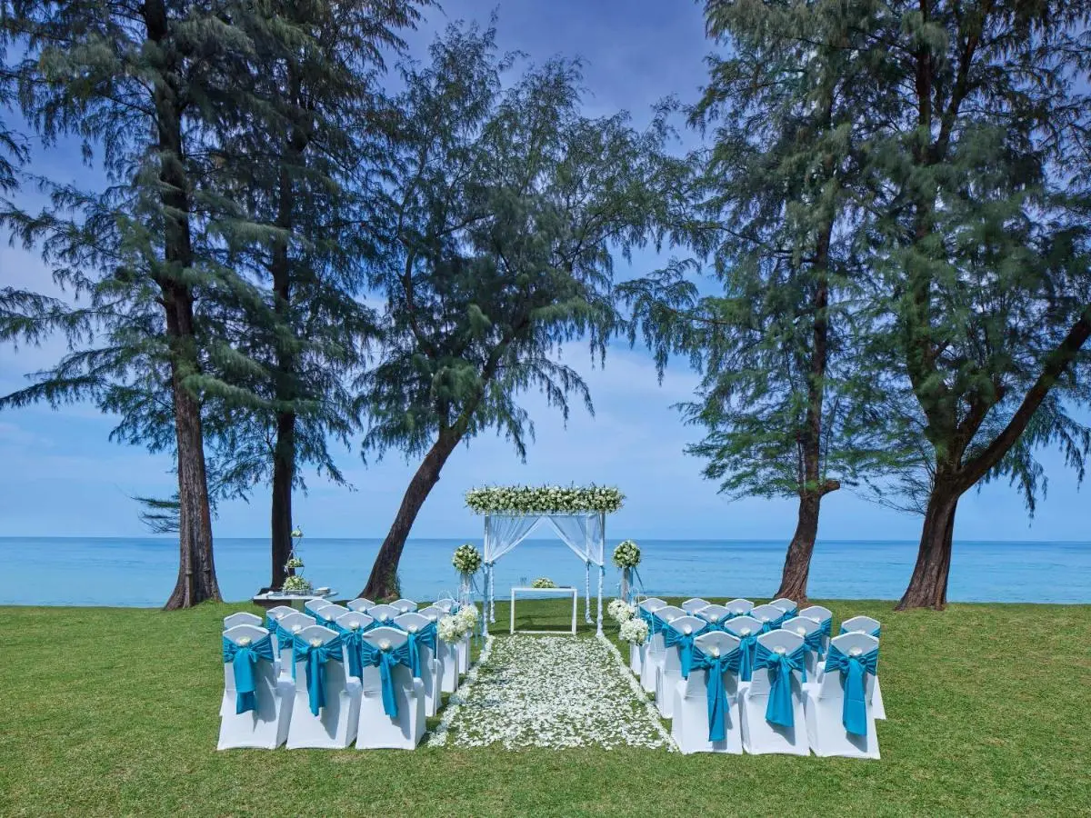 Elegant Outdoor Wedding Ceremony Setup by the Water at Bang Tao Beach