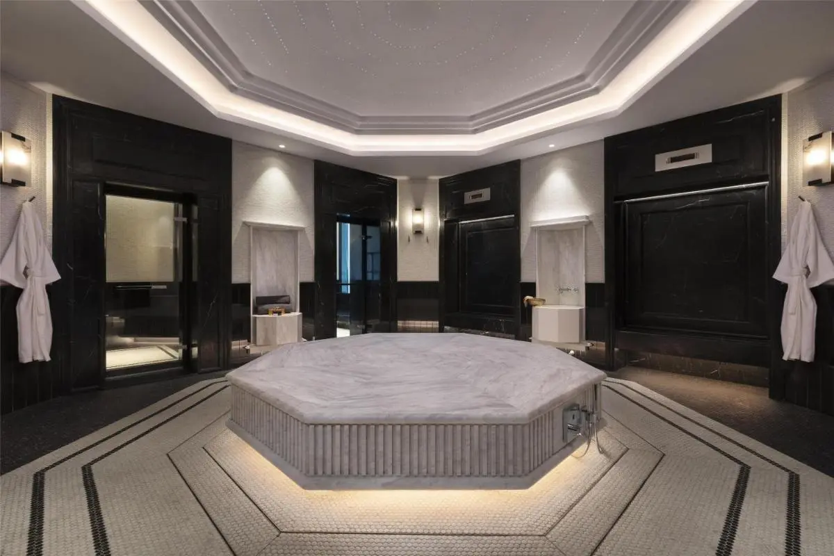Elegant Spa Room with Central Octagonal Platform and Ambient Lighting in Pathumwan Bangkok