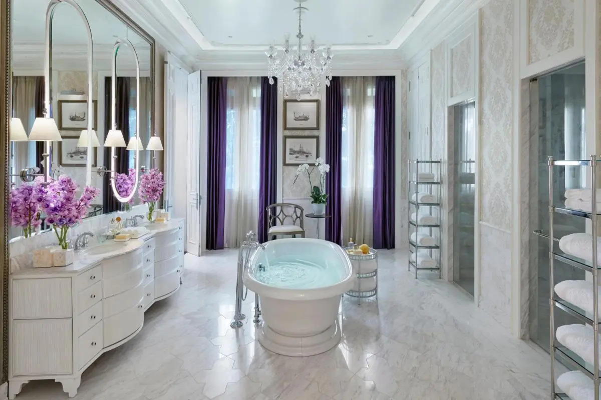 Elegant Spacious Bathroom with Freestanding Tub and Dual Showers in Bang Rak