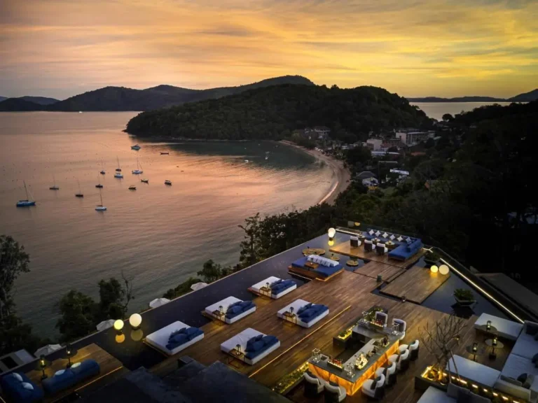 Elevated Infinity Pool Terrace Overlooking Panwa Beach Bay at Sunset