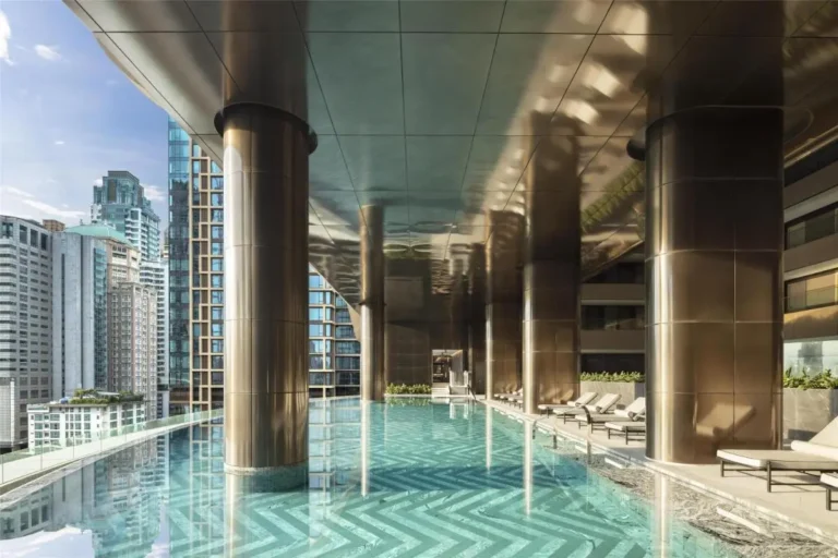 Elevated Outdoor Swimming Pool with City Views and Lounge Area in Pathumwan Bangkok
