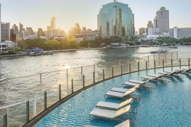 Elevated Outdoor Swimming Pool with River Views and Urban Skyline in Khlong San Bangkok