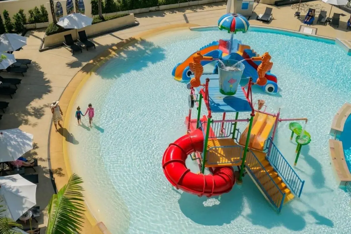 Family-Friendly Shallow Outdoor Pool with Water Play Structures at Rawai Beach