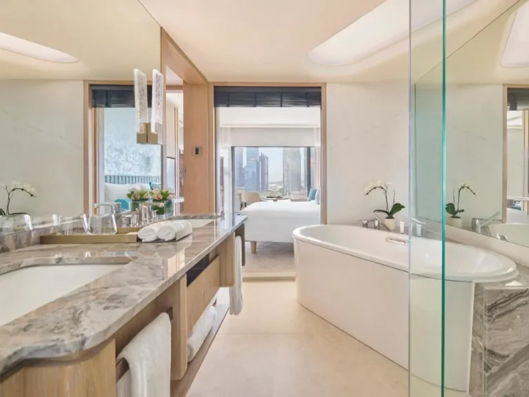 Freestanding Bathtub and City View Bathroom in Marina Bay Suite