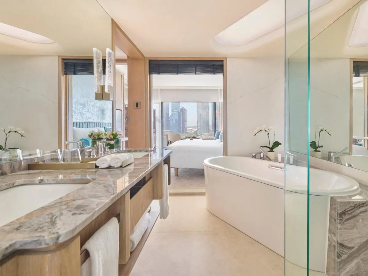 Mandarin Oriental Singapore Freestanding Bathtub and City View Bathroom in Marina Bay Suite