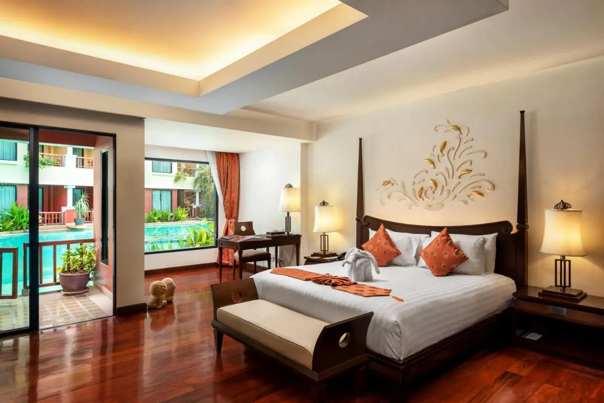 Hotel Room with Direct Access to Outdoor Pool and Scenic Balcony View at Patong Beach