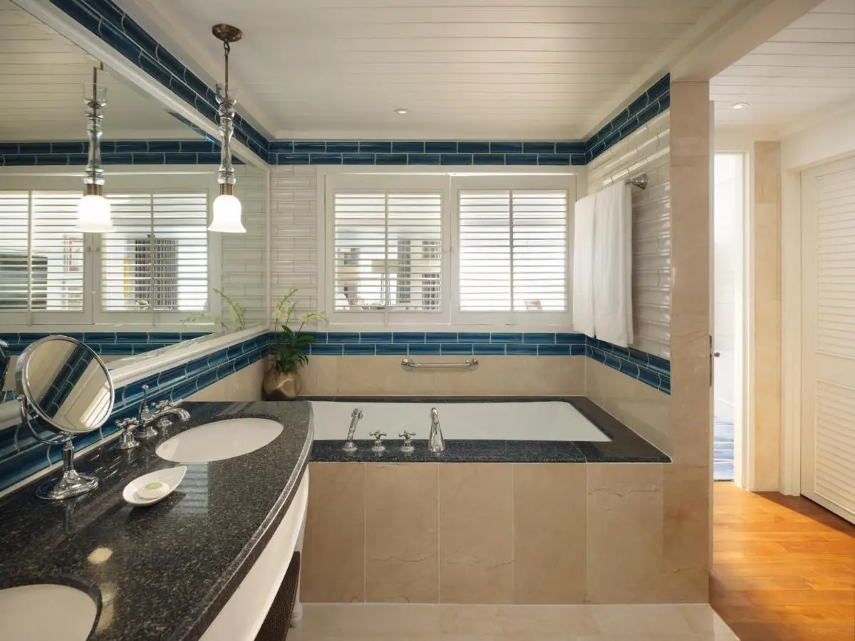 Mandarin Oriental, Bangkok Indoor Bathroom with Built-in Bathtub and Double Sink Vanity in Bang Rak