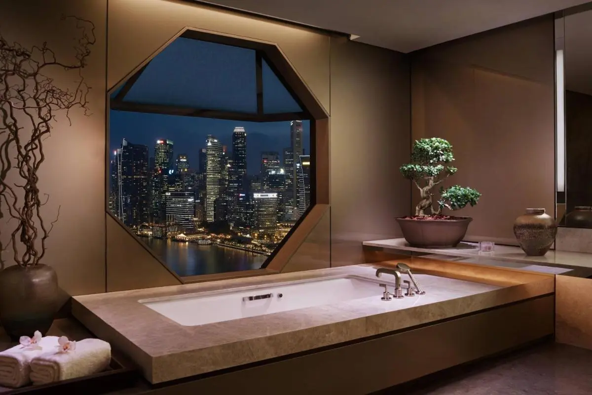 Indoor Bathtub with City Skyline View and Natural Elements in Marina Bay
