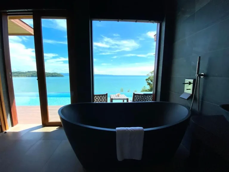 Indoor Black Freestanding Bathtub and Outdoor Infinity Pool with Ocean View in Phuket Town
