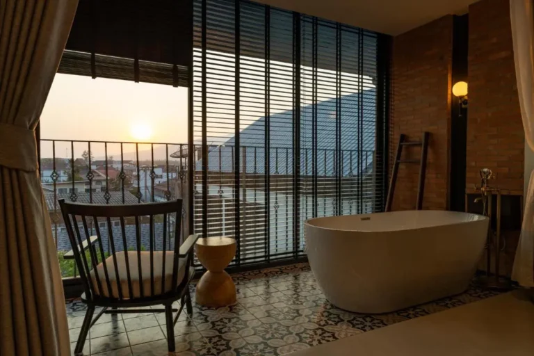 Indoor Freestanding Bathtub with Urban Views and Patterned Tile Floor in Phra Sing Chiang Mai