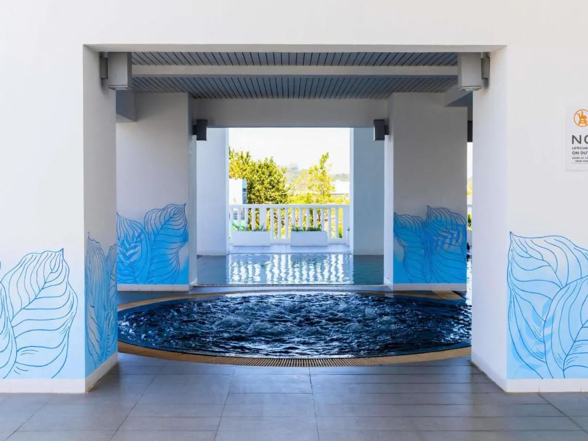 Novotel Phuket City Phokeethra Indoor Jacuzzi and Outdoor Swimming Pool Wellness Area with Scenic Views in Phuket Town