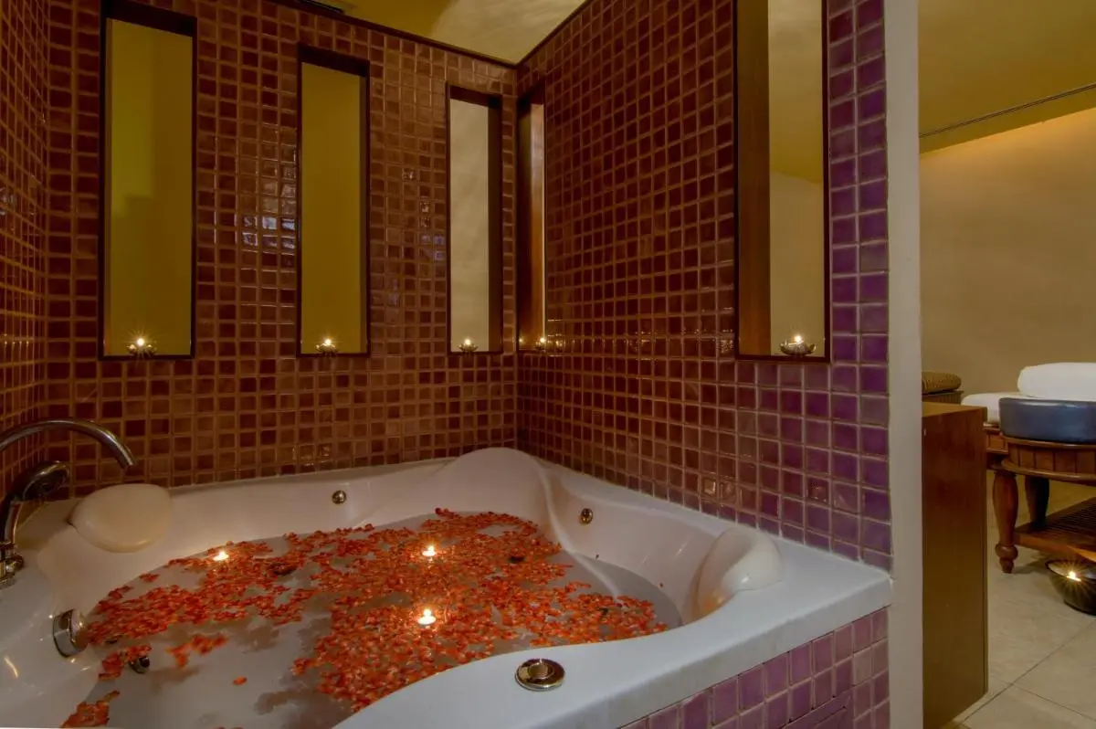 Indoor Jacuzzi and Wellness Treatment Area with Ambient Lighting in Ratchathewi Spa