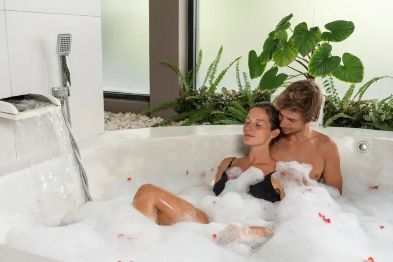 Indoor Jacuzzi with Foamy Water and Rose Petals at Patong Beach Spa
