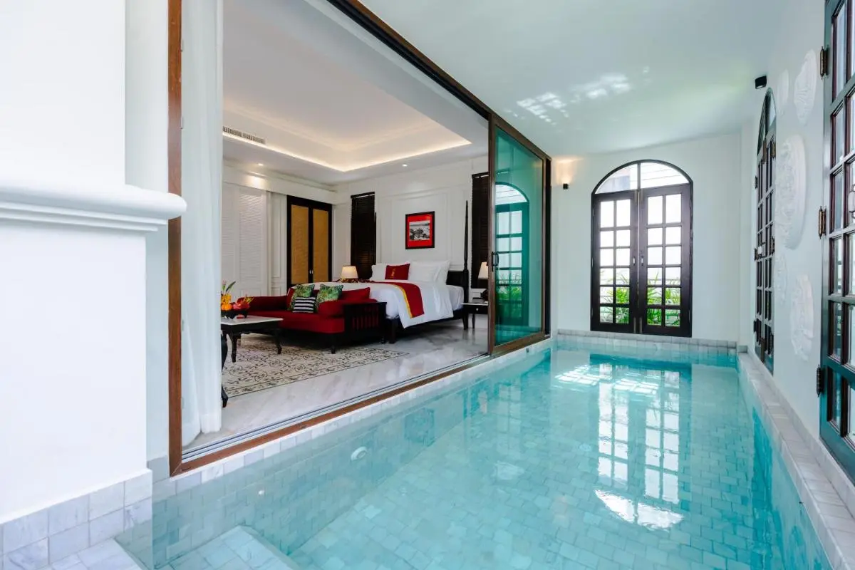 Indoor Pool Adjacent to Bedroom with Sliding Glass Door in Phra Sing Chiang Mai