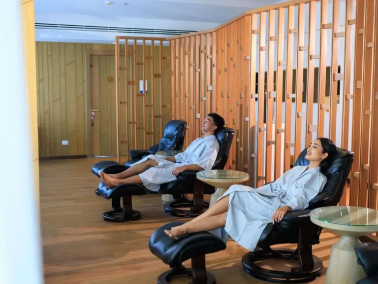 Indoor Relaxation Area with Recliner Chairs and Wooden Accents in Phuket Town