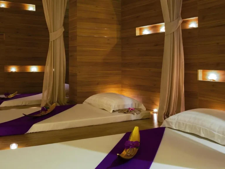 Indoor Relaxation Room with Cushioned Beds and Ambient Lighting at Patong Beach