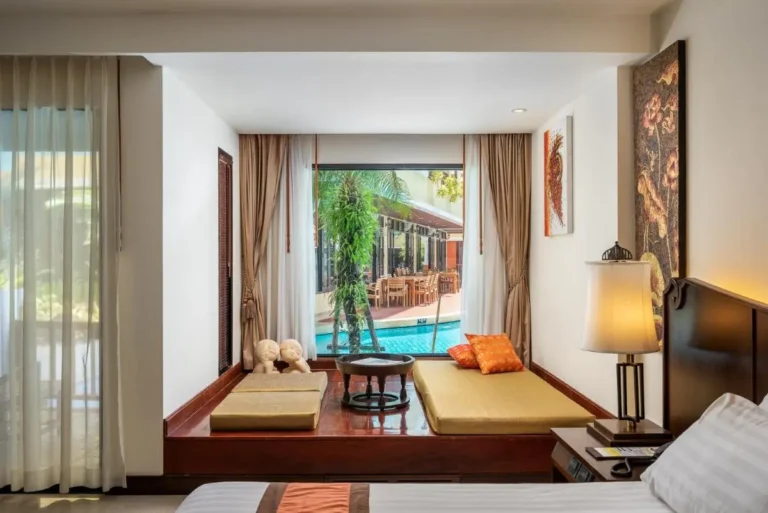 Indoor Relaxation Room with Jacuzzi Mats and Outdoor Pool View at Patong Beach