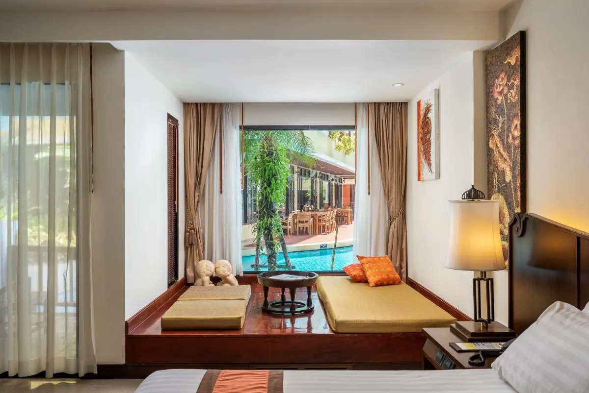 Patong Paragon Resort & Spa SHA Extra Plus Indoor Relaxation Room with Jacuzzi Mats and Outdoor Pool View at Patong Beach Phuket Province