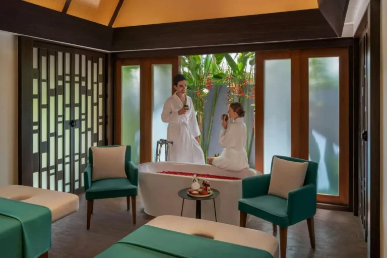 Indoor Spa Room with Freestanding Bathtub and Relaxation Area at Mai Khao Beach