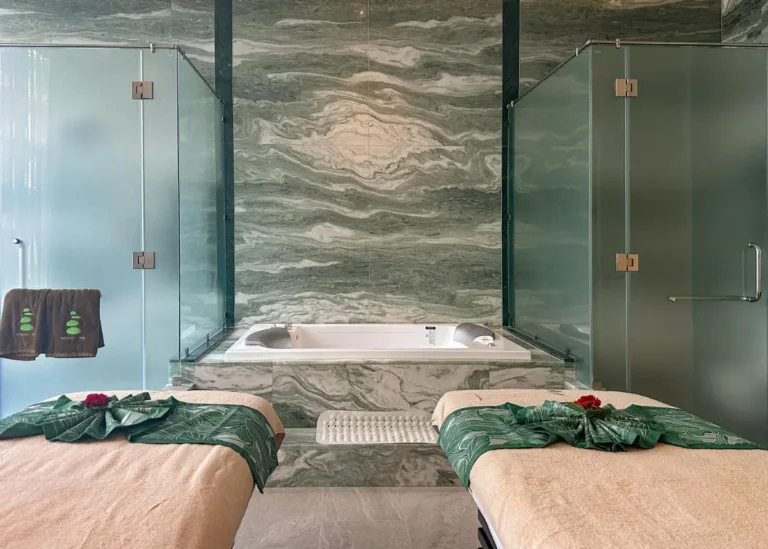 Indoor Spa Room with Marble Whirlpool Bathtub and Massage Tables at Bang Tao Beach