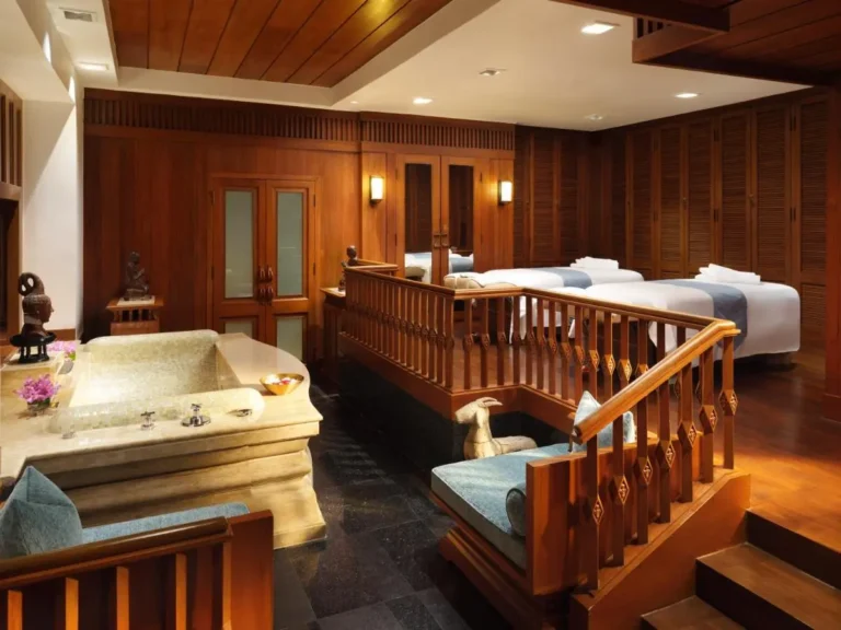 Indoor Spa Room with Massage Tables and Soaking Tub in Bang Rak Wellness Center
