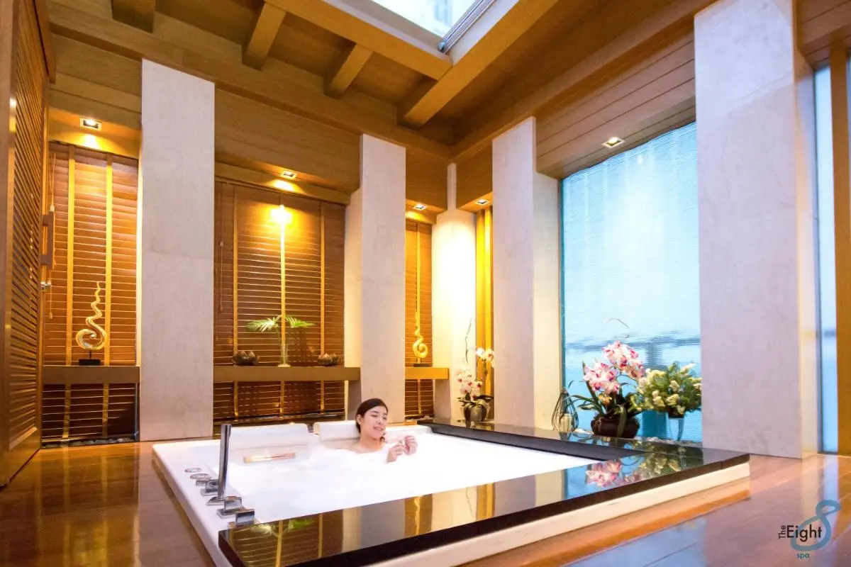 Indoor Spa Room with Whirlpool Bathtub and Natural Light in Pathumwan Bangkok