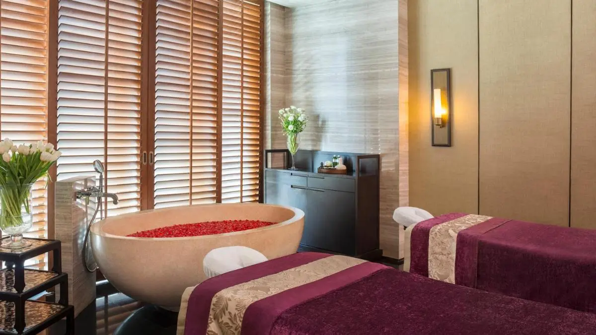 Siam Kempinski Hotel Bangkok Indoor Spa Treatment Room with Bathtub and Massage Tables in Pathumwan Bangkok